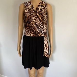 EUC sz M sleeveless romper by Tiana B.Inseam 6”,length 32”elastic waist